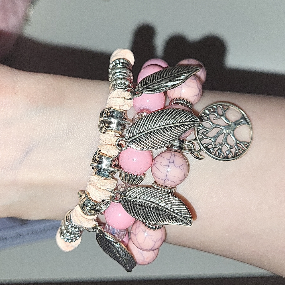 Pink and silver yoga bracelets, bought at a yoga studio, set of 3 bracelets